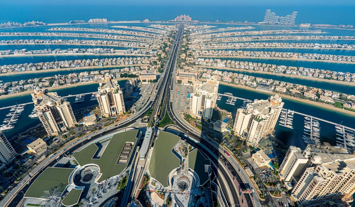 Palm Jumeirah and Palm Jebel Ali aerial view showcasing luxury beachfront villas and private beaches in Dubai.